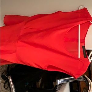 Fitted red silk blouse